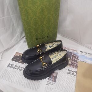 Gucci Black Leather Loafers with Gold Hardware